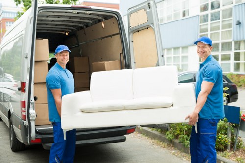 Risk assessment being reviewed before loading items into a van