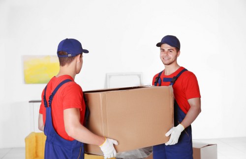 Commercial moving team handling office relocation items in Winchmore Hill