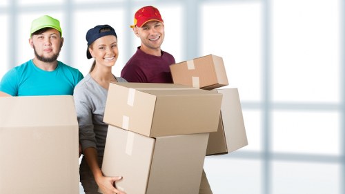 Packed boxes and furniture ready for local house removals