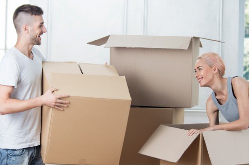 Careful loading of household furniture into a removals van
