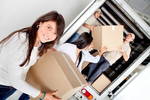 Packing and loading household items for a Winchmore Hill removal
