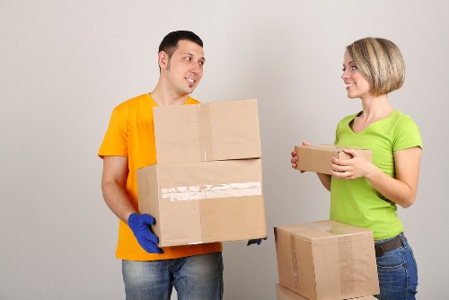 Packed business equipment and office furniture prepared for transport