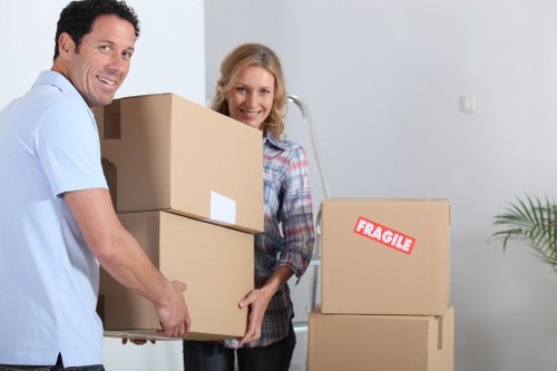 Careful furniture handling during a flat move in Winchmore Hill